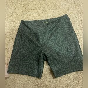 TEK GEAR plus size bike shorts in a two tone medium to dark sage green color.